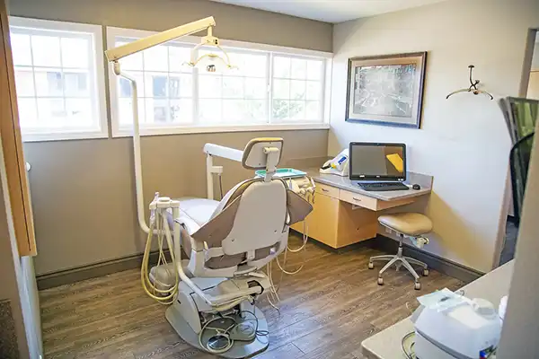 A dental chair and dental equipment in the office at Shull Family Dentistry 